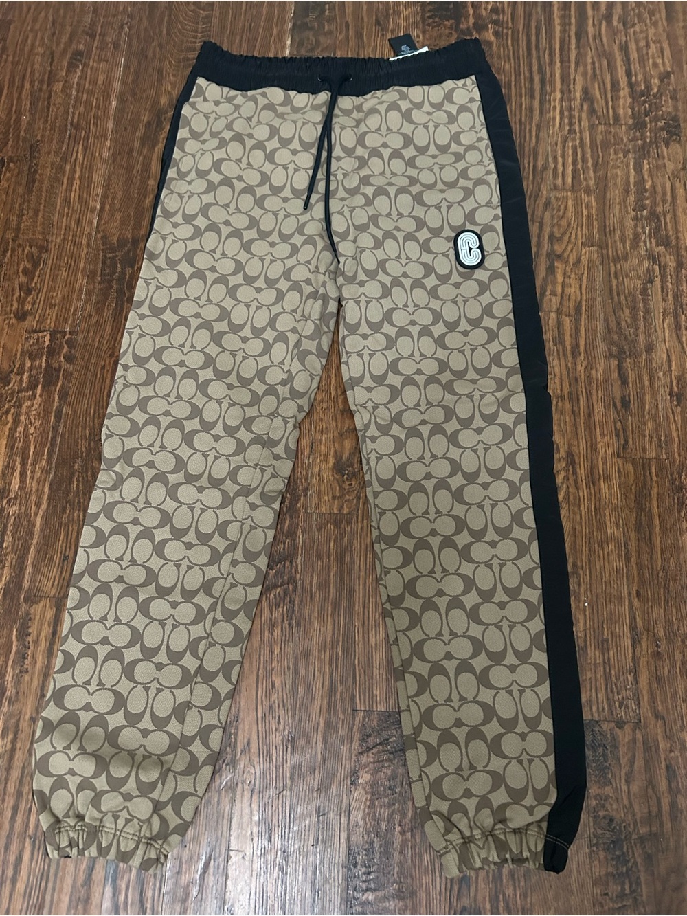 Coach Tan Monogram Sweatpants with Black Side Panel